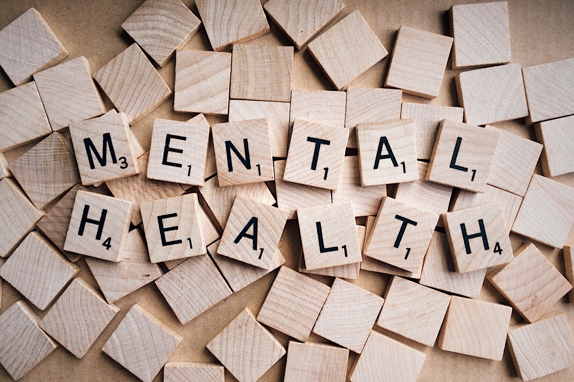 Scrabble letters spelling out Mental Health